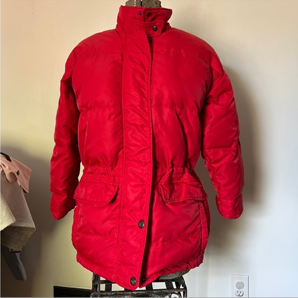 Red insulated winter jacket, fleece lined pockets, wind proof sleeves, pockets